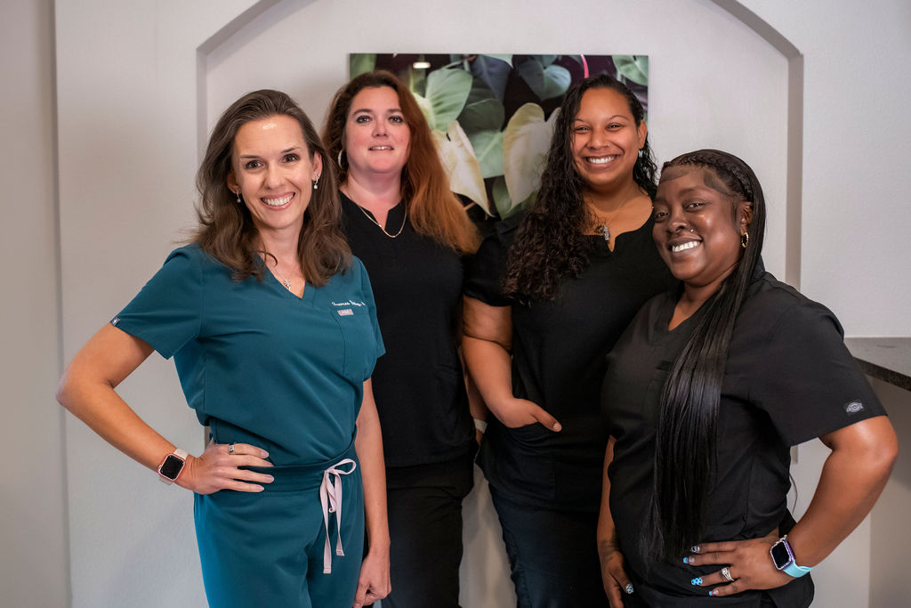 The Synergy Family Medicine team — Dr. Frances Dilley with her staff at the Melbourne, FL office